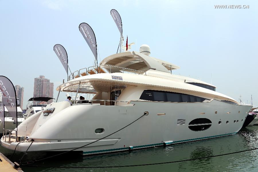 Photo taken on May 11, 2013 shows a yacht at an exhibition held by the Gold Coast Yacht Country Club in Hong Kong, south China. The exhibition has attracted 70 exhibitors around the world with their luxurious yachts as well as a fancy lifestyle at sea. (Xinhua/Li Peng) 