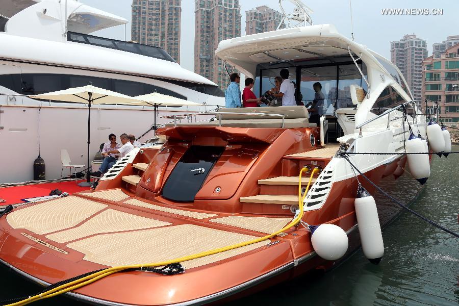 Photo taken on May 11, 2013 shows a yacht at an exhibition held by the Gold Coast Yacht Country Club in Hong Kong, south China. The exhibition has attracted 70 exhibitors around the world with their luxurious yachts as well as a fancy lifestyle at sea. (Xinhua/Li Peng)