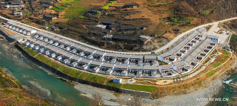 This bird eye view show the Longtanzi Village, Kangxian County in Longnan City, northwest China's Gansu Province, March 1, 2011. In the year of 2008, a massive earthquake occurred in Gansu's neighbouring province Sichuan, and Longnan was also battered by the disaster. During the past five years, a total of 3,905 reconstruction projects have been carried out in the city, where over 240,000 households have their houses rebuilt, and hundreds of schools and hospitals have been set up as well. (Xinhua/Wang Yaodong)