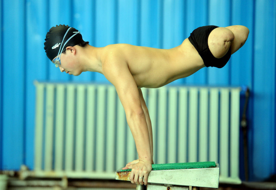 Before the quake, Dai Guohong’s expectation on his future was to get a steady job after graduation. Though the quake deprived him of walking ability, it provoked Dai to rediscover his talent in swimming pool. Dai won national breaststroke championship and became a member of Chinese Paralympic team for London 2012. Currently, Dai has devoted himself to serving the disable and adjusted his target to be a professional social worker.  (Xinhua/Li Xiaoguo)