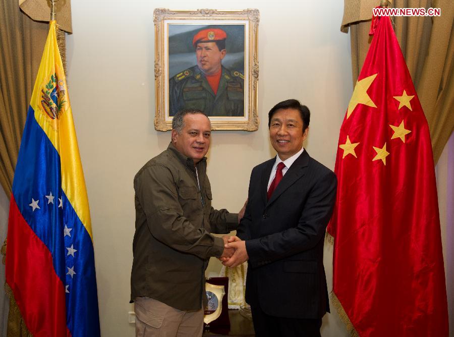 Chinese Vice President Li Yuanchao (R) meets with Venezuelan National Assembly President Diosdado Cabello in Caracas, Venezuela, May 13, 2013. (Xinhua/Weng Xinyang)