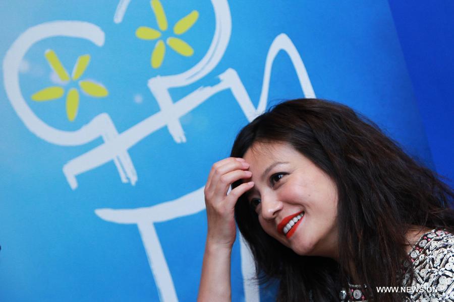 Chinese actress Zhao Wei attends the news conference held on the sidelines of the opening of the 3rd France-China Film Festival in Paris, France, May 13, 2013. The 3rd France-China Film Festival kicks off in Paris on Monday. (Xinhua/Gao Jing)  