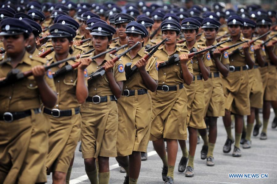 Sri Lankan army personnel march during the Victory Day parade rehearsal in Colombo, capital of Sri Lanka, on May 15, 2013. Sri Lanka celebrates War Heroes Week with a military parade scheduled for May 18. The parade celebrates the fourth anniversary of the defeat of the Tamil Tiger rebels in May 2009, ending a 37-year long separatist conflict. (Xinhua/Pushpika Karunaratne)