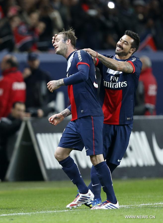 Paris Saint-Germain's English midfielder David Beckham(L) reacts as he is substituted by Ezequiel Lavezzi during a French League 1 football match between Paris St Germain and Brest at Parc des Princes stadium in Paris on May 18, 2013.(Xinhua/Wang Lili)