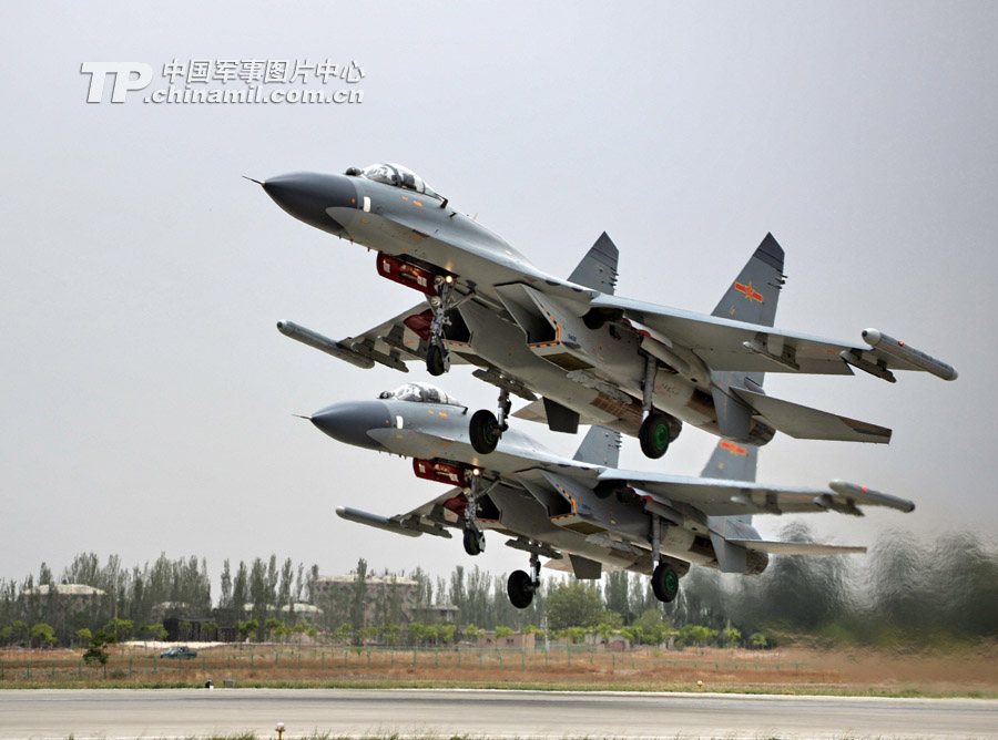 Fighters of a regiment of the air force under the Lanzhou Military Area Command (MAC) of the Chinese People's Liberation Army (PLA) in air confrontation training in a simulated actual-battlefield environment. (China Military Online/Zhu Zhizhang)