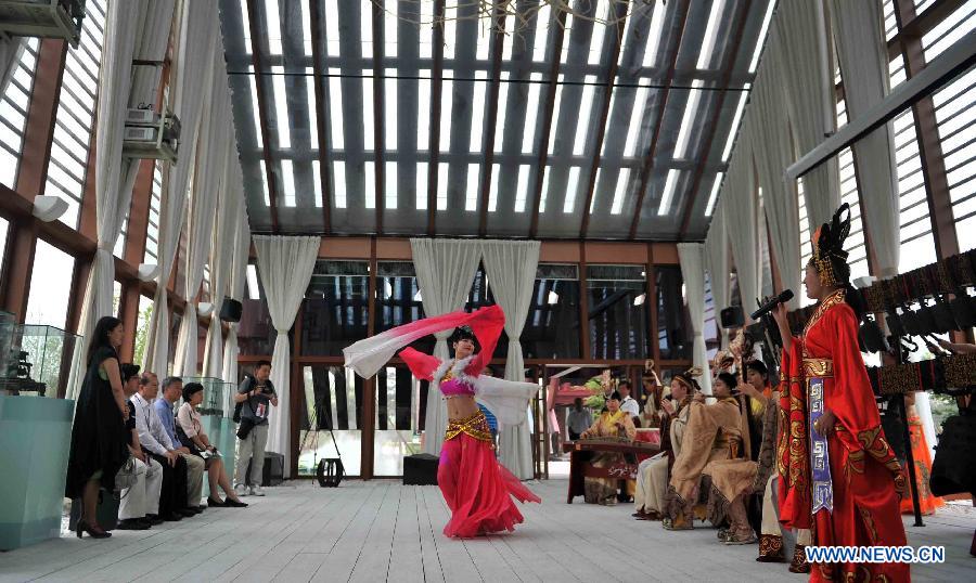 Photo taken on May 18, 2013 shows a view of Wuhan Park in the 9th China (Beijing) International Garden Expo in Beijing, capital of China. The expo opened in southwestern Fengtai district in Beijing on Saturday and will last till Nov. 18, 2013. Garden designs from 69 Chinese cities and 29 countries will be presented. (Xinhua/Li Wen)