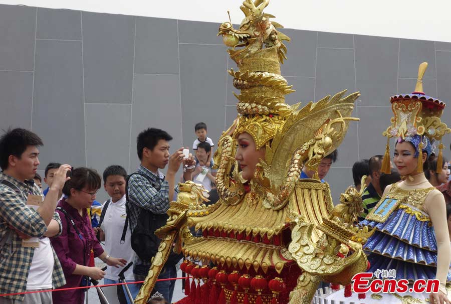 Models present creations at the Garden Expo Park in Fengtai District, Beijing, May 19, 2013. The Ninth China (Beijing) International Garden Expo kicked off on Saturday. Garden designs from 69 Chinese cities and 29 countries will be presented. (CNS/Liu Guanguan)