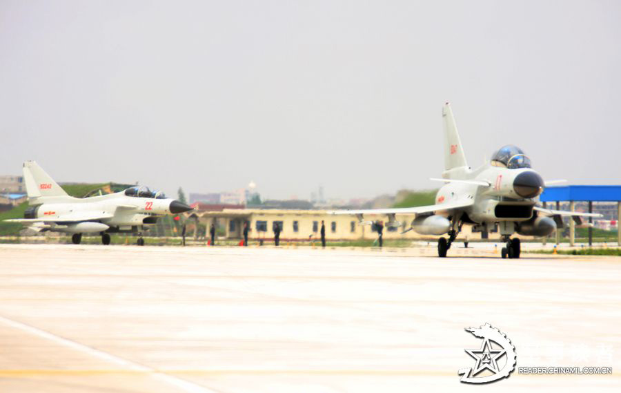 Fighters of a flight regiment under the aviation force of the East Sea Fleet of the Navy of the Chinese People's Liberation Army (PLA) in actual-combat training. (China Military Online/Cai Bo, Qian Xiaohu)