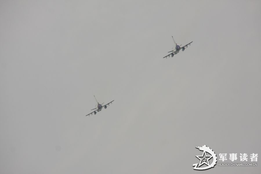 Fighters of a flight regiment under the aviation force of the East Sea Fleet of the Navy of the Chinese People's Liberation Army (PLA) in actual-combat training. (China Military Online/Cai Bo, Qian Xiaohu)