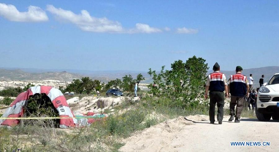 Image taken on May 20, 2013 shows the scene of a hot air balloon collision in Cappadocia, central Turkey. A hot air balloon crashed on Monday morning in central Turkish province of Nevsehir, killing two and injuring 23, Turkish local media reported. (Xinhua/NTV) 