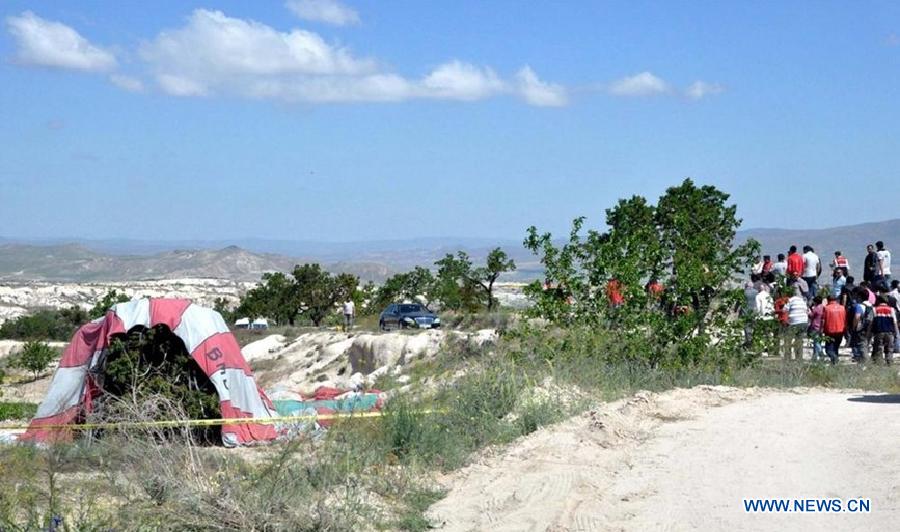 Image taken on May 20, 2013 shows the scene of a hot air balloon collision in Cappadocia, central Turkey. A hot air balloon crashed on Monday morning in central Turkish province of Nevsehir, killing two and injuring 23, Turkish local media reported. (Xinhua/NTV) 