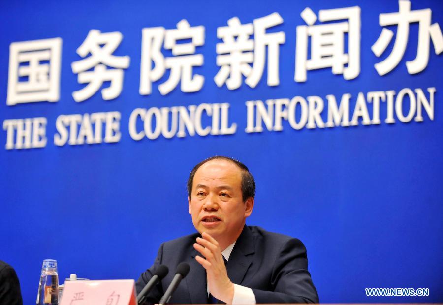 Yan Xun, chief engineer of the Department of the Wildlife Conservation and Nature Reserve Management under the State Forestry Administration, answers questions during a press conference on the wildlife conservation in China held by the State Council Information Office in Beijing, capital of China, May 21, 2013. (Xinhua/Chen Yehua)