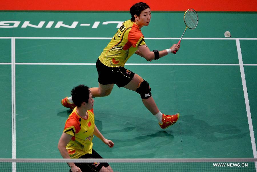 Wang Xiaoli(R) and Yu Yang of China return a shot during the 2013 Sudirman Cup world mixed team badminton championships against Indonesia's Polii Greysia/Maheswari Nitya Krishinda in Kuala Lumpur, Malaysia, on May 21, 2013. Wang and Yu won 2-0. (Xinhua/Chen Xiaowei)