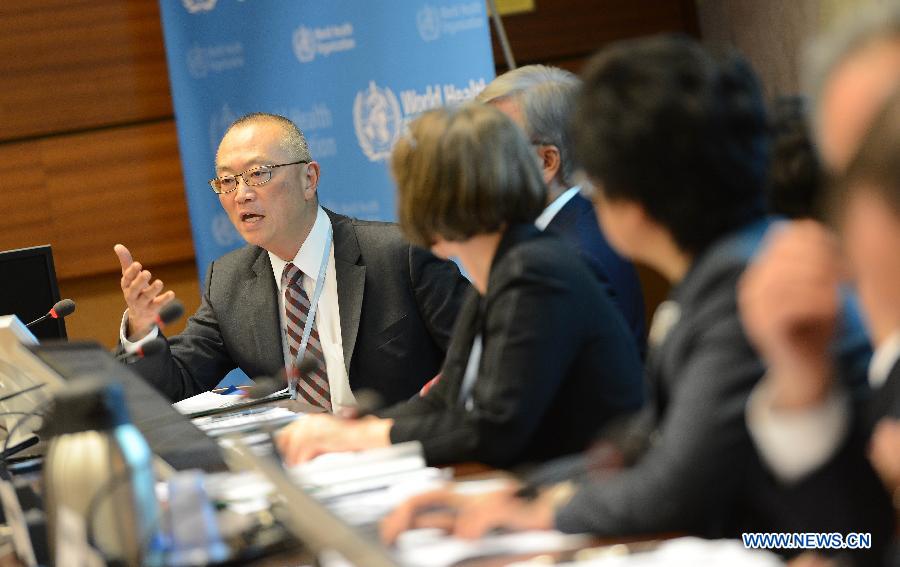 Keiji Fukuda, Assistant Director-General of World Health Organization, speaks during a side event on Influenza A (H7N9) of the 66th World Health Assembly in Geneva, Switzerland, May 21, 2013. China has gained international recognition for its immediate and effective responses to the human infections with H7N9 virus, a side event on Influenza A (H7N9) showed Tuesday. (Xinhua/Wang Siwei)