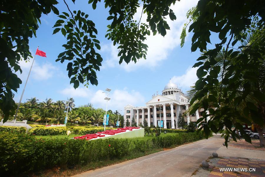 Photo taken on May 21, 2013 shows the building of local government on the Yongxing Island in Sansha City, south China's Hainan Province. (Xinhua/Zha Chunming)