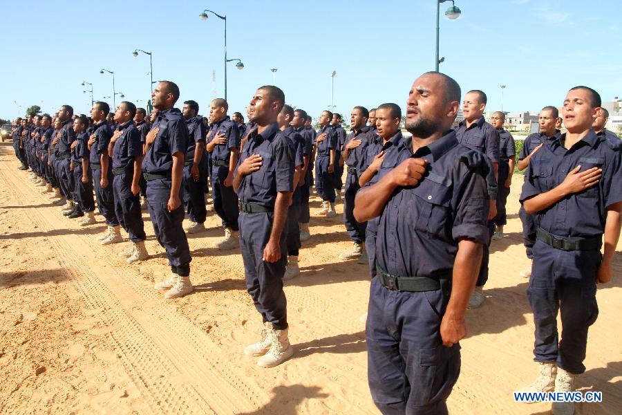 Libyan soldiers take part in a military parade during a graduation ceremony of a new crop of Libyan National Army soldiers, in Tripoli, Libya, May 23, 2013. (Xinhua/Hamza Turkia) 