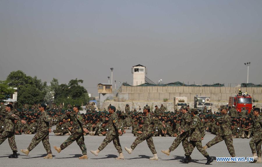 Afghan National Army soldiers attend their graduation ceremony in Kabul, Afghanistan on May 23, 2013. A total of 1600 army soldiers graduated after three months of training in Kabul. (Xinhua/STR) 