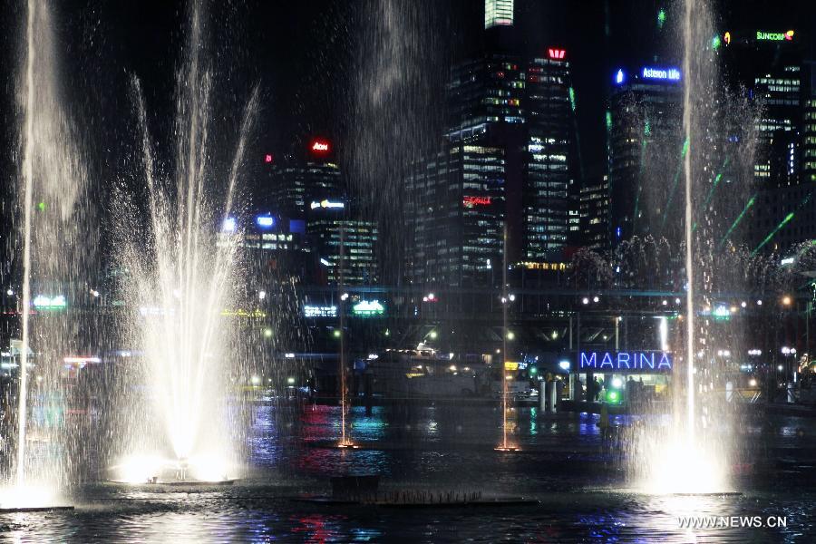 The Darling Harbour is lit up during the Vivid Sydney, a festival of light, music and ideas, in Sydney, Australia, May 24, 2013. (Xinhua/Jin Linpeng) 