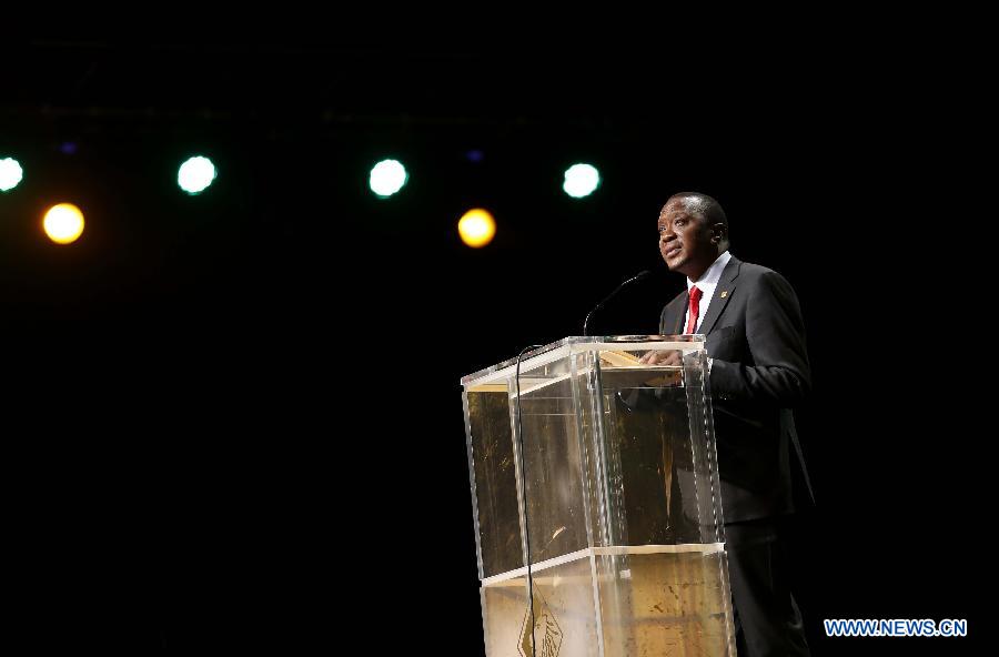 Kenyan President Uhuru Kenyatta addresses the ceremony to mark the 50th anniversary of the founding of the African Union, the successor of the Organisation of African Unity (OAU), in Addis Ababa, Ethiopia, on May 25, 2013. (Xinhua/Zhang Chen)