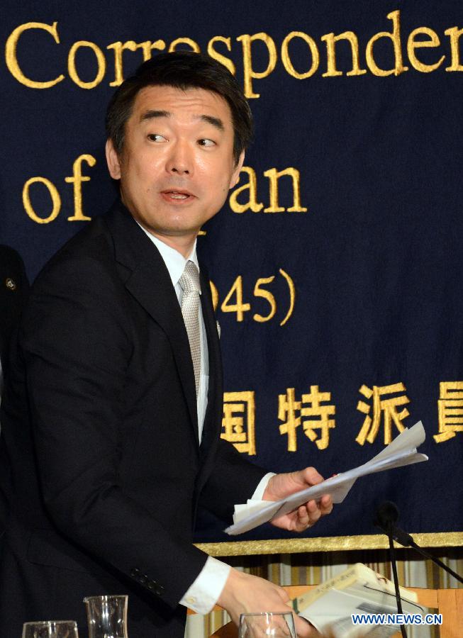 Osaka Mayor Toru Hashimoto attends a press conference at the Foreign Correspondents' Club of Japan in Tokyo, May 27, 2013. Toru Hashimoto on Monday denied his remarks on wartime so-called "comfort women" at Foreign Correspondents' Club of Japan, saying it was not his intention at all to say women who were used as sexual slaves during wartime are necessary. (Xinhua/Ma Ping) 