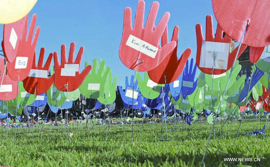 Photo taken on May 27, 2013, shows the large art work of "The Sea of Hands" during the Reconciliation Week 2013 in the University of Sydney, Australia. The first "Sea of Hands" was held on Oct. 12, 1997, in Australia's capital of Canberra. (Xinhua/Jin Linpeng) 