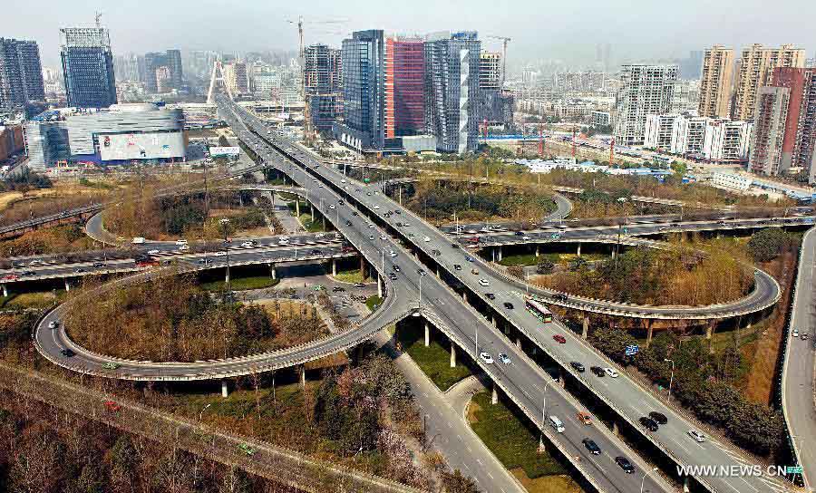 Photo taken on March 5, 2013 shows the Tianfu flyover in Chengdu, capital of southwest China's Sichuan Province. By the end of 2012, Chengdu's GDP has reached 800 billion RMB (about 130.48 billion U.S. dollars), ranking the 3rd place in China's sub-provincial cities. By May of 2013, more than 230 enterprises in the Fortune 500 have come to Chengdu. The 2013 Fortune Global Forum will be held in Chengdu from June 6 to June 8. Chengdu, an ancient city with a history of over 2,300 year, is developing into an international metropolis with its huge economic development potential as well as its special cultural environment. (Xinhua/Xue Yubin)