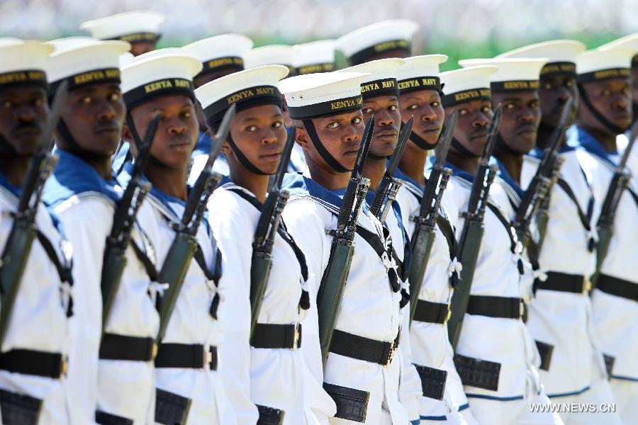 Soldiers march at a military parade to celebrate the 50th Madaraka Day in Nairobi, capital of Kenya, June 1, 2013. Kenya formed its self-government and attained the right to manage its own affairs from British colonialists on June 1, 1963. (Xinhua/Meng Chenguang) 