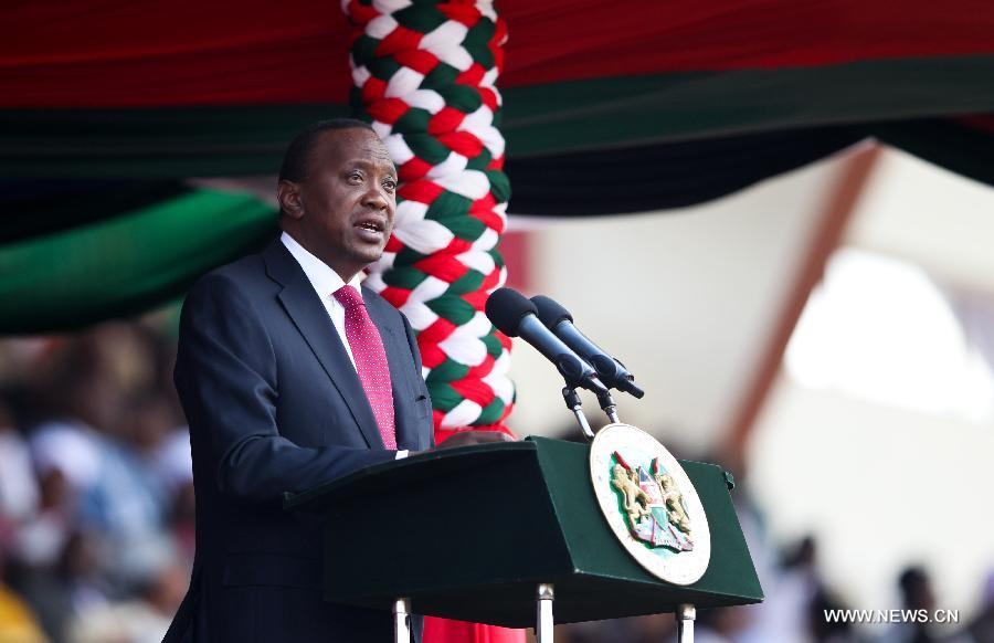 Kenyan President Uhuru Kenyatta addresses a military parade to celebrate the 50th Madaraka Day in Nairobi, capital of Kenya, June 1, 2013. Kenya formed its self-government and attained the right to manage its own affairs from British colonialists on June 1, 1963. (Xinhua/Meng Chenguang) 