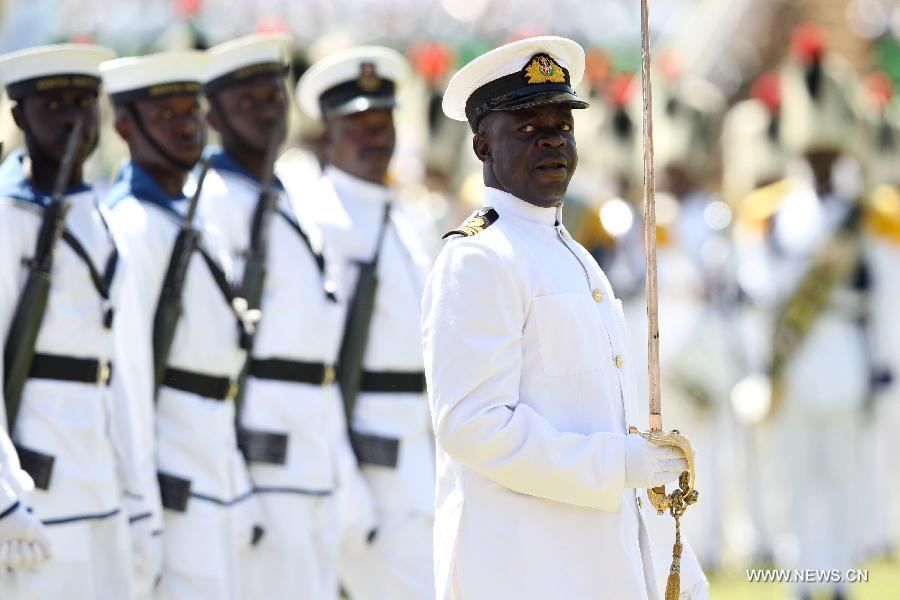 Soldiers march at a military parade to celebrate the 50th Madaraka Day in Nairobi, capital of Kenya, June 1, 2013. Kenya formed its self-government and attained the right to manage its own affairs from British colonialists on June 1, 1963. (Xinhua/Meng Chenguang) 