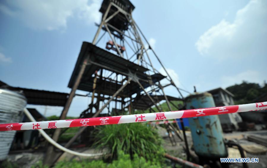 Photo taken on June 3, 2013 shows the Simachong coal mine, where a colliery gas explosion happened, is cordoned off in Shaodong County, central China's Hunan Province. Ten people have been confirmed dead after a colliery gas explosion occurred on Sunday at Simachong coal mine, local authorities said on Monday. (Xinhua/Li Ga)