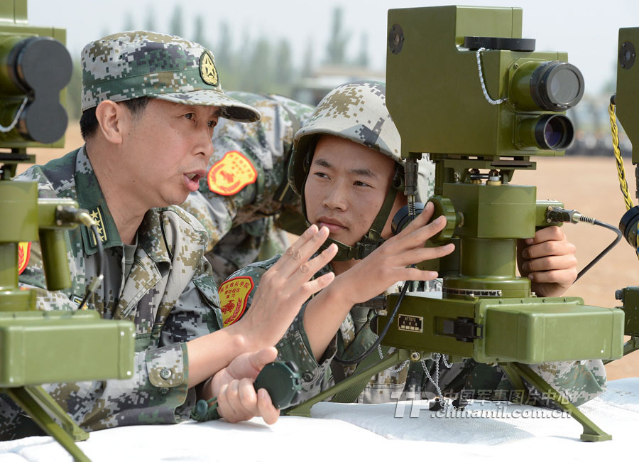 Cadets who will graduate from Langfang Barrack of Nanjing Artillery Academy of the Chinese People's Liberation Army (PLA) in a comprehensive live-ammunition tactical exercises in harsh conditions and complex environment. (China Military Online/Liu Fengan) 