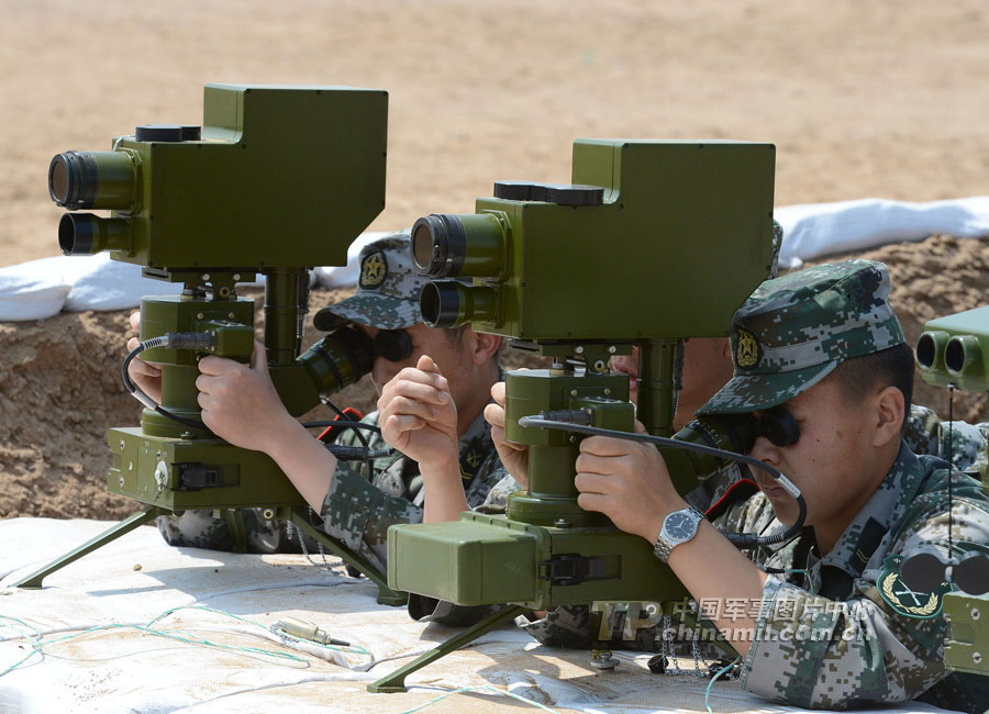 Cadets who will graduate from Langfang Barrack of Nanjing Artillery Academy of the Chinese People's Liberation Army (PLA) in a comprehensive live-ammunition tactical exercises in harsh conditions and complex environment. (China Military Online/Liu Fengan) 