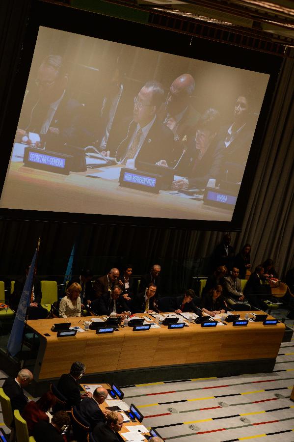 UN Secretary-General Ban Ki-moon attends a special event to mark the opening for signature of the Arms Trade Treaty, at the UN headquarters in New York, on June 3, 2013. The Arms Trade Treaty (ATT), the first international treaty regulating the global conventional weapons commerce, opened for signature at United Nations headquarters on Monday. (Xinhua/Niu Xiaolei) 