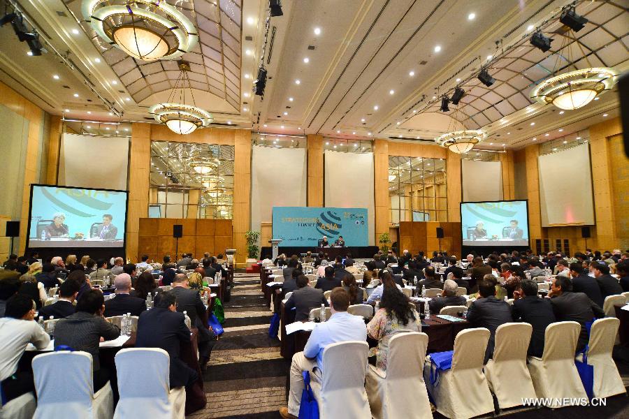 Participants attend the 27th Asia-Pacific Roundtable meeting at Kuala Lumpur, Malaysia, on June 4, 2013. The three-day Asia-Pacific Roundtable, with the theme " Strategizing Change in Asia," will see senior officials, diplomats, policy-makers and academics from all over the region discuss a wide range of issues. (Xinhua/Chong Voon Chung)  