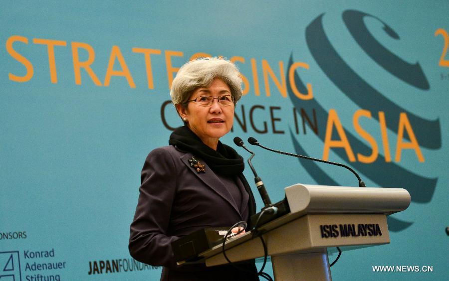 Fu Ying, chairwoman of the Foreign Affairs Committee of the 12th National People's Congress of the People's Republic of China, addresses the 27th Asia-Pacific Roundtable meeting at Kuala Lumpur, Malaysia, on June 4, 2013. The three-day Asia-Pacific Roundtable, with the theme " Strategizing Change in Asia," will see senior officials, diplomats, policy-makers and academics from all over the region discuss a wide range of issues. (Xinhua/Chong Voon Chung)