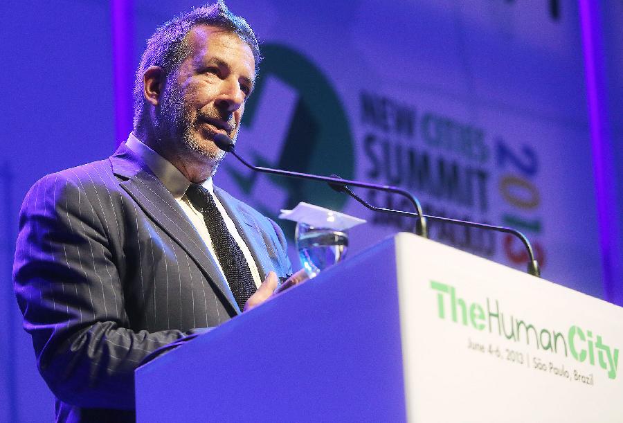 John Rossant, founder and Chairman of the New Cities Foundation, speaks during the opening of the "New Cities Summit 2013-The Human City", in Sao Paulo, Brazil, on June 4, 2013. The event that will be held in Sao Paulo until June 6, brings together experts from around the world to discuss topics such as security, transportation, health and environment in the urban transformation process. (Xinhua/Rahel Patrasso) 