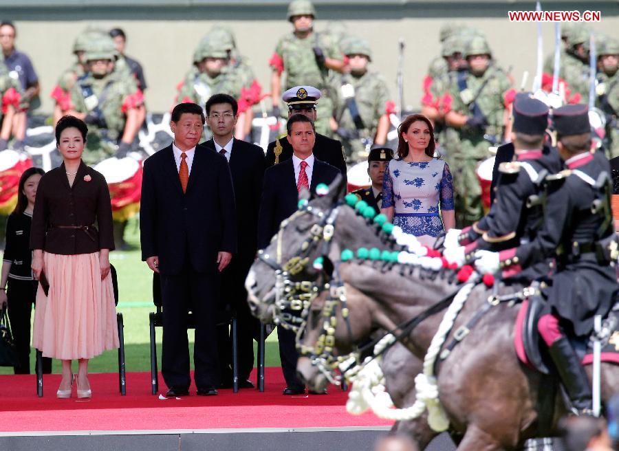 Chinese President Xi Jinping (2nd L Front) attends a welcoming ceremony held for him by Mexican President Enrique Pena Nieto (3rd L Front) in Mexico City, capital of Mexico, June 4, 2013. (Xinhua/Ding Lin)