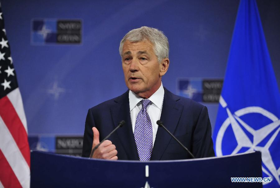 United States Secretary of Defense Chuck Hagel addresses a press conference after two-days NATO Defence Ministers Meeting at its headquarters in Brussels, capital of Belgium, June 5, 2013. (Xinhua/Ye Pingfan)