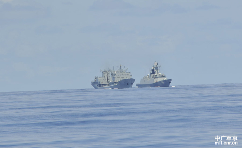 The high-sea training taskforce under the North China Sea Fleet of the Navy of the Chinese People's Liberation Army (PLAN) conducted comprehensive replenishment training in a sea area of the Western Pacific Ocean on June 1, 2013. It is the first time for the guided missile frigate "Linyi" to complete its replenishment during sailing since it was commissioned late last year. (mil.cnr.cn/Chen Zhong, Kong Xianglong and Zhang Gang)