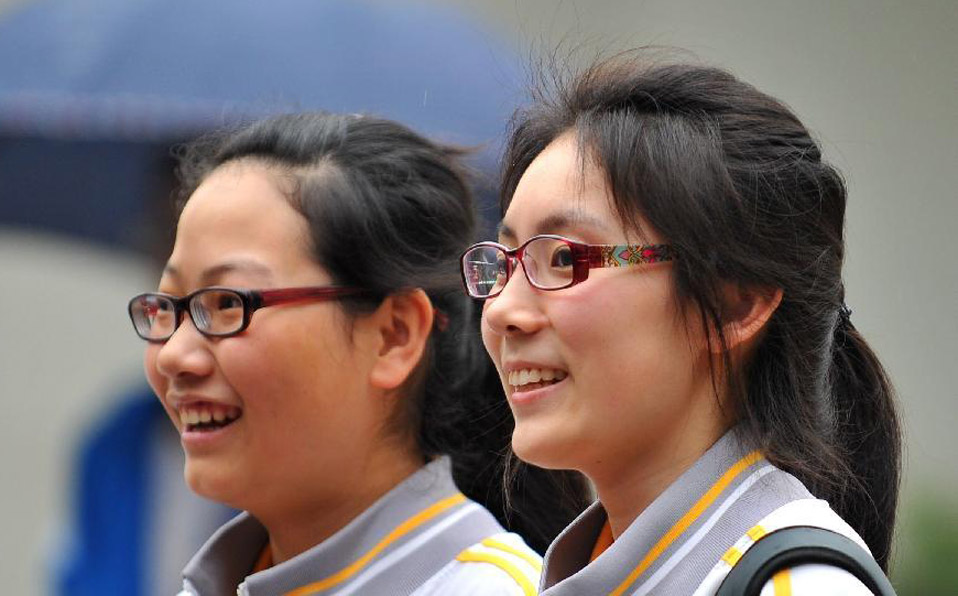 Students brave rain to sit college entrance exam