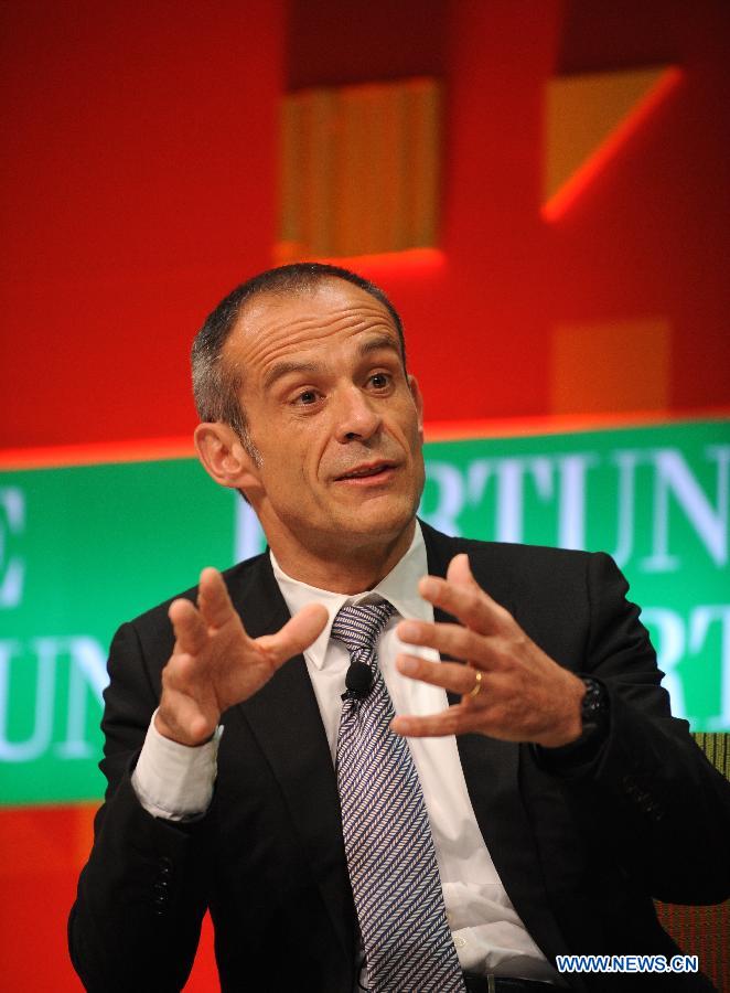 Jean-Pascal Tricoire, chairman and CEO of the Schneider Electric, speaks at the discussion "Rethinking Our Cities" during the 2013 Fortune Global Forum in Chengdu, capital of southwest China's Sichuan Province, June 7, 2013. (Xinhua/Xue Yubin)