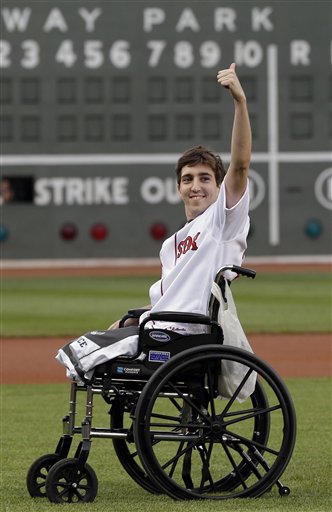 Eff Bauman, a Boston Marathon bombing victim, is invited to kick off in Fenway Park. (Photo/Osports)