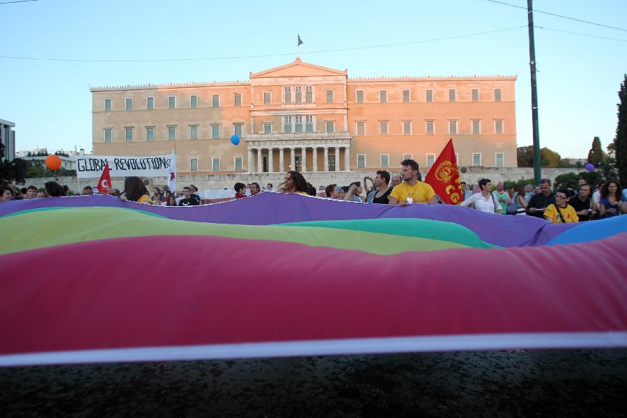 People take part in the 9th Gay Pride Festival in Athens, Greece, on June 8, 2013. (Xinhua/Marios Lolos)