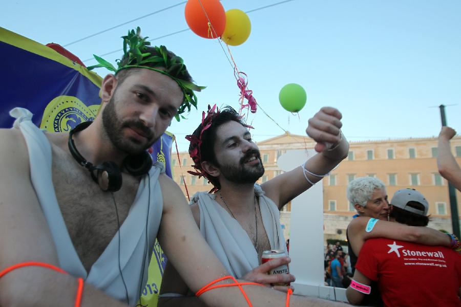 People take part in the 9th Gay Pride Festival in Athens, Greece, on June 8, 2013. (Xinhua/Marios Lolos)