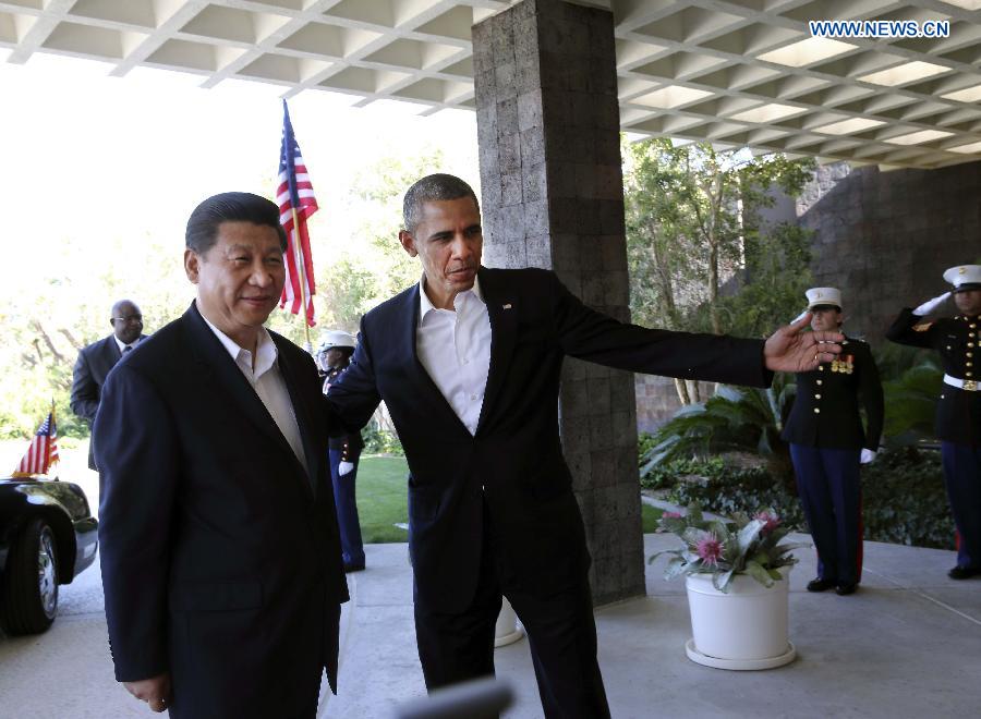 Chinese President Xi Jinping is greeted by U.S. President Barack Obama at the Annenberg Retreat, California, the United States, June 7, 2013. Chinese President Xi Jinping and his U.S. counterpart, Barack Obama, met Friday to exchange views on major issues of common concern. (Xinhua/Lan Hongguang) 