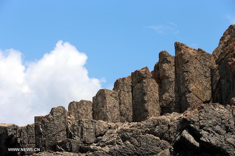 Photo taken on June 9, 2013 shows the scenery of rock on the South Ninepin Island of the Ninepin Group in Hong Kong, south China. The Ninepin Group, or Kwo Chau Islands, is a group of islands in the southeastern Hong Kong. (Xinhua/Li Peng) 