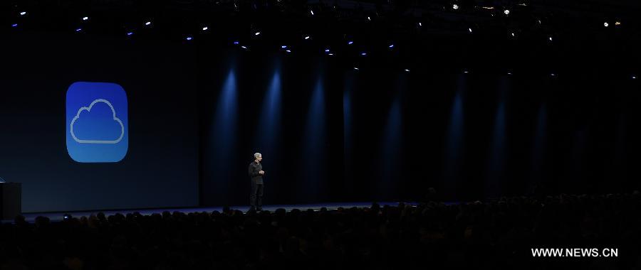 Apple CEO Tim Cook addresses the 2013 Apple WWDC at the Moscone Center in San Francisco, California, the United States, on June 10, 2013. (Xinhua)