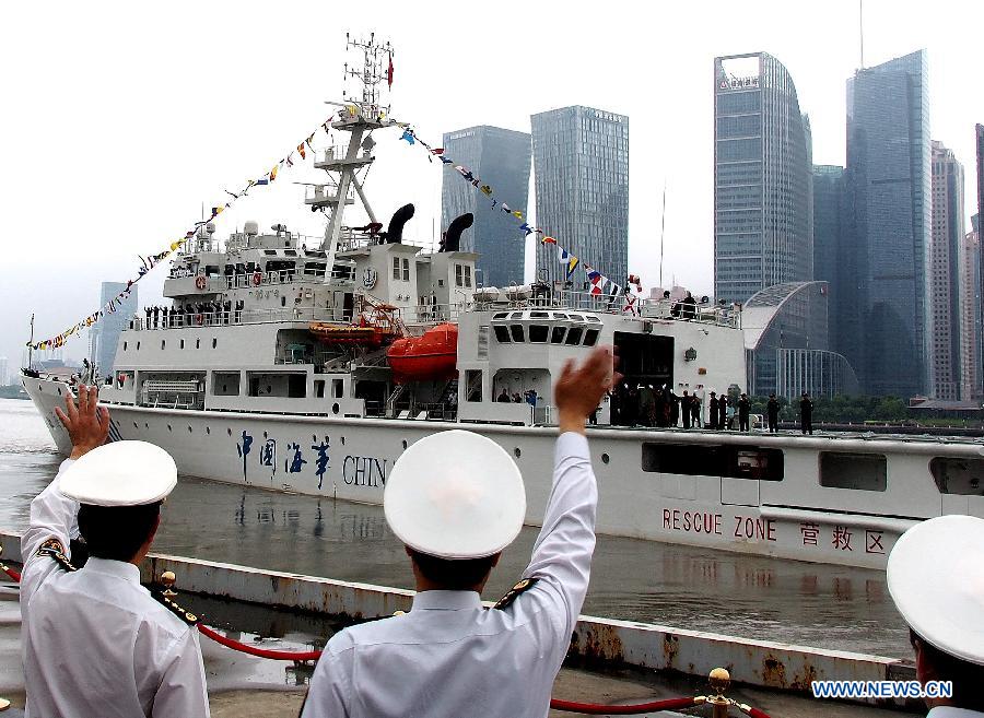 The ship "Haixun 01" of China's Maritime Safety Administration (MSA) leaves Shanghai, east China, June 10, 2013. The public service ship will conduct a 62-day voyage to visit Australia, Indonesia, Myanmar and Malaysia. (Xinhua/Chen Fei)