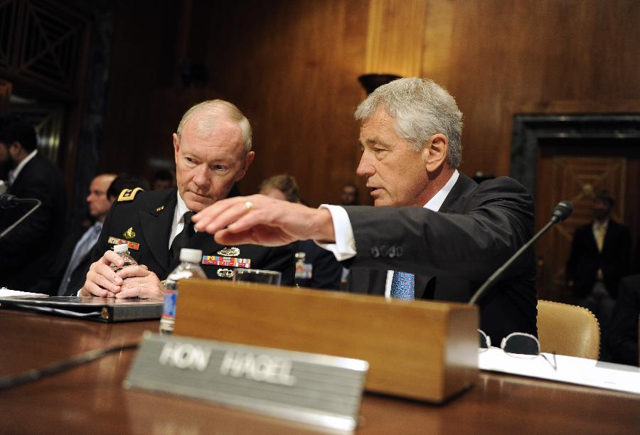 Chuck Hagel (R), U.S. Secretary of Defense and Martin Dempsey, Chairman of Joint Chiefs of Staff, testify before the U.S. Senate Budget Committee about U.S. President Barrack Obama's proposed budget request for fiscal year 2014 for defense, on Capitol Hill in Washington D.C., capital of the United States, June 12, 2013. (Xinhua/Zhang Jun) 