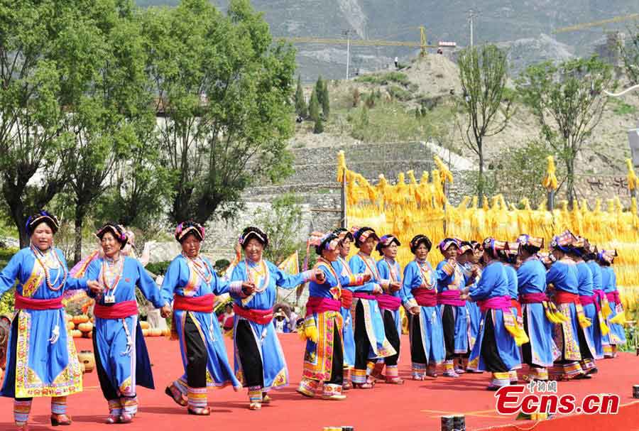 People of the Qiang ethnic group celebrate Wari'ezu Festival in Maoxian County, Southwest China's Sichuan Province, June 12, 2013. For thousands of years, there has been a convention among Qiang people, namely, to offer sacrifices to Sister Salang, the Goddess of Dance and Song. Every three years, Qiang people will get together and hold Wari'ezuconventional activities from May 3rd to May 5th in the lunar calendar. Since it is the only convention for Qiang females, it is also named by local people as Women's Day. (CNS/An Yuan)